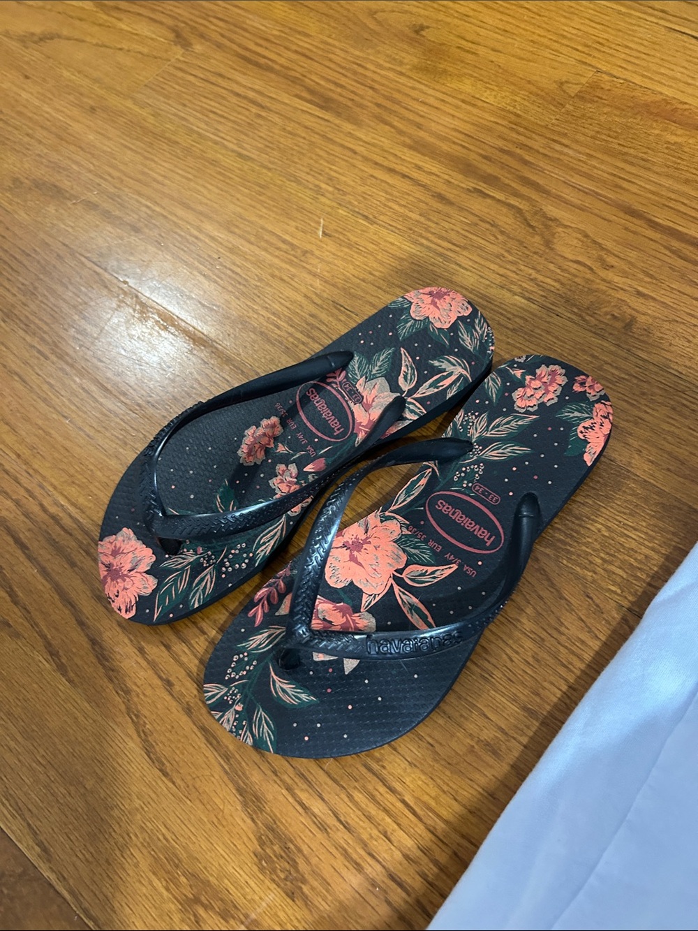 Havaianas Black Flip Flops with Coral Floral Print